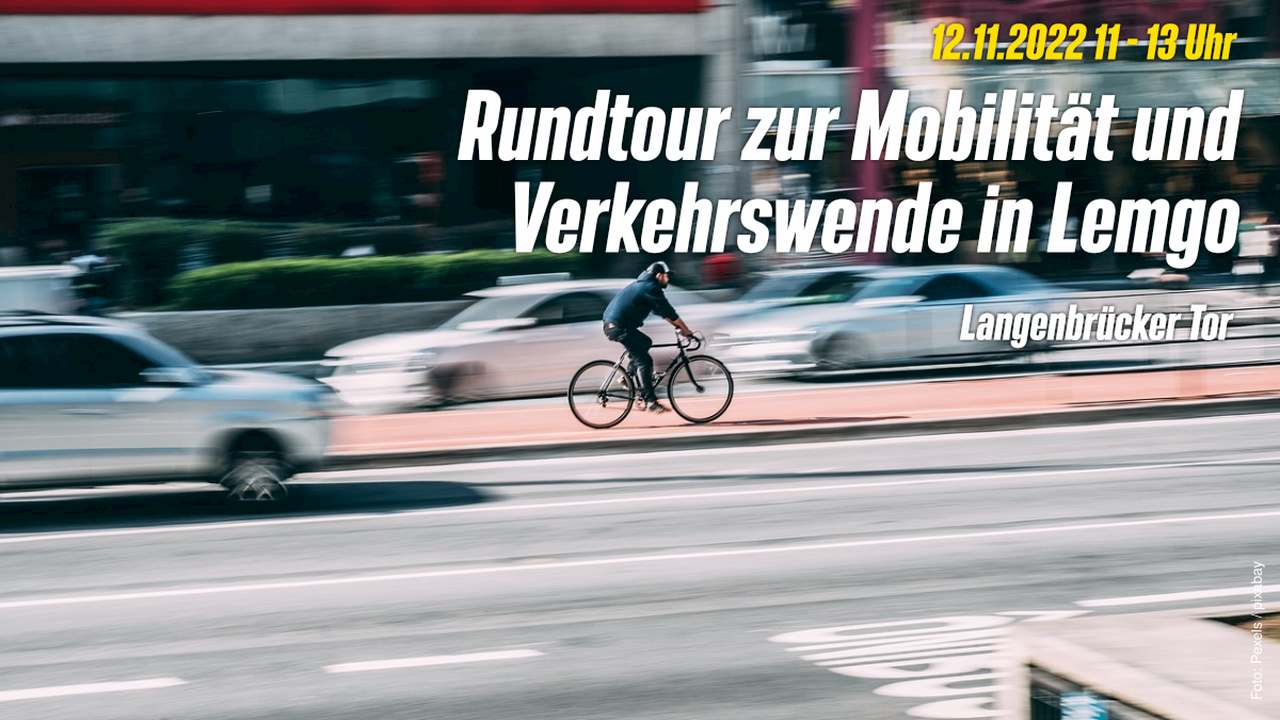 Radfahrer inmitten schnell fahrender Autos - Text: 12.11.2022 11:00 Uhr - Rundtour zur Mobilität und Verkehrswende in Lemgo, Langenbrücker Tor
